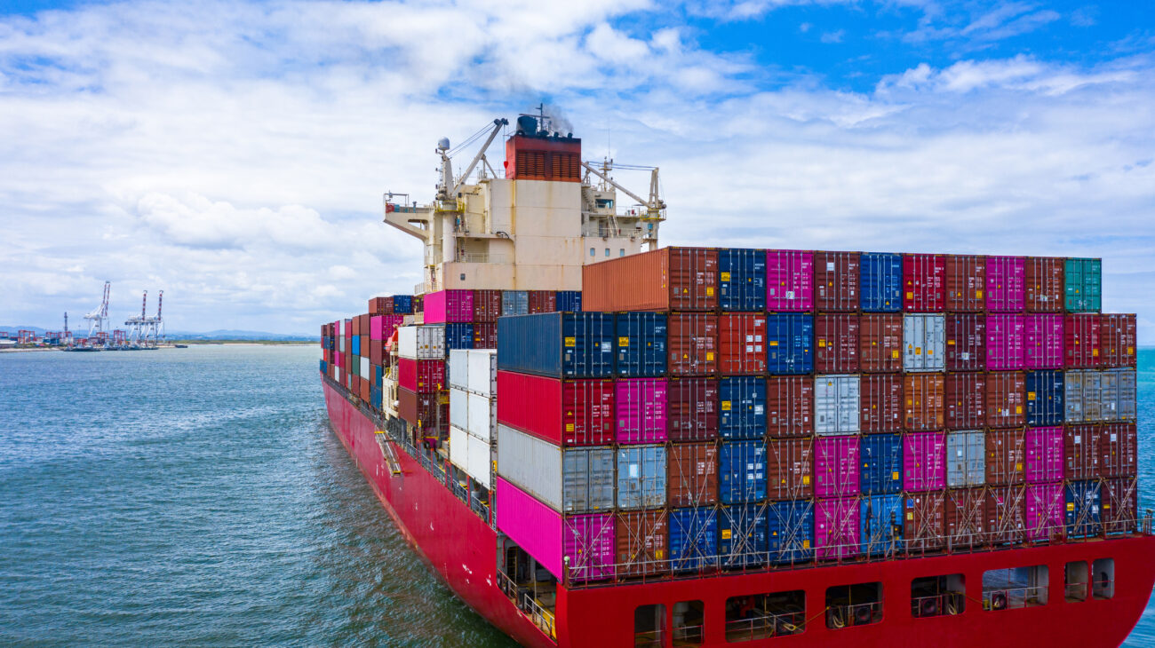 Container cargo ship carrying container for business freight imp